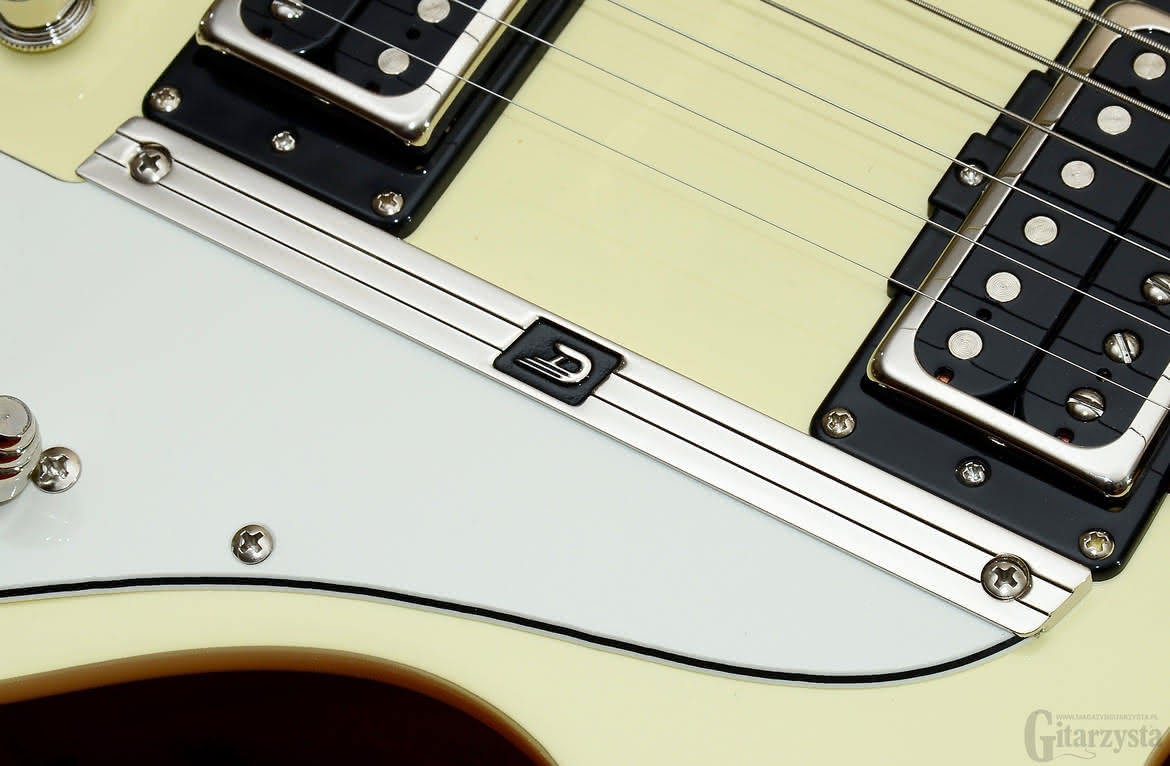 Metalowe, oryginalne elementy wykończenia w stylu Art Deco to znak firmowy gitar Duesenberga.