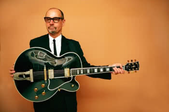 Andy Fairweather Low supportem Erica Claptona