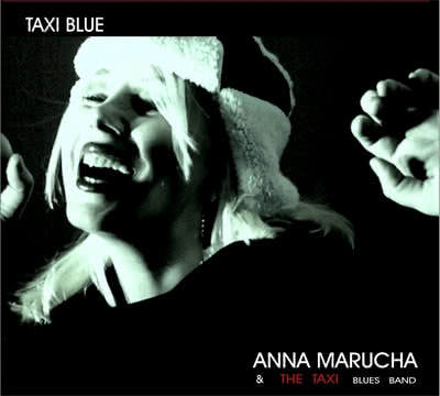 Anna Marucha w niebieskiej taksówce